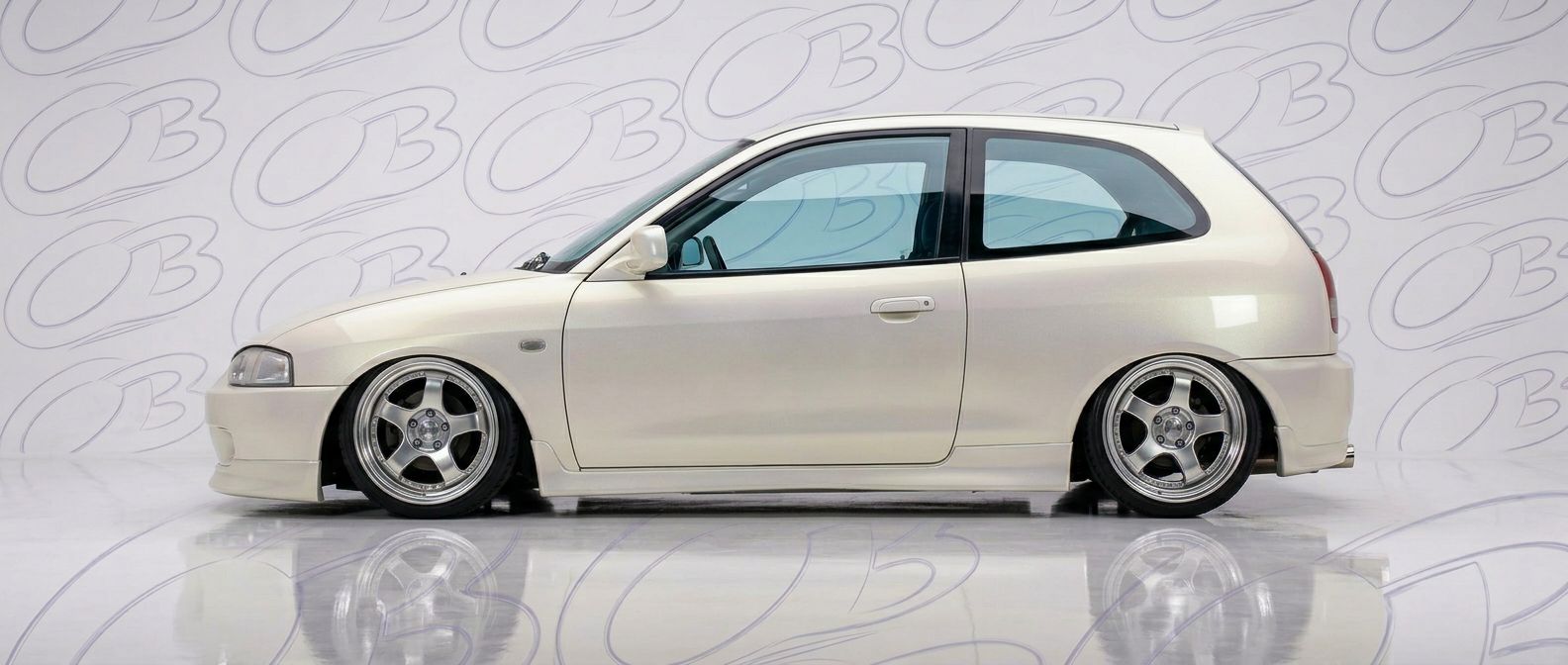 High-quality 1999 Mitsubishi Mirage 1999 exterior shot with professional studio lighting.