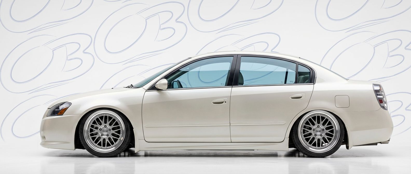 Front-angle view of 2004 Nissan Altima 2004 - Durable and stylish exterior enhancement.