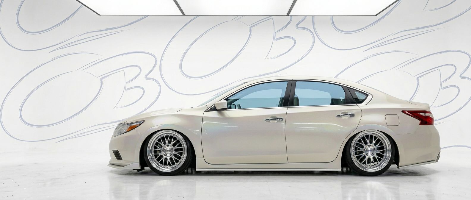 Top-tier 2016 Nissan Altima 2016 featuring a high-gloss finish and carbon fiber weave.