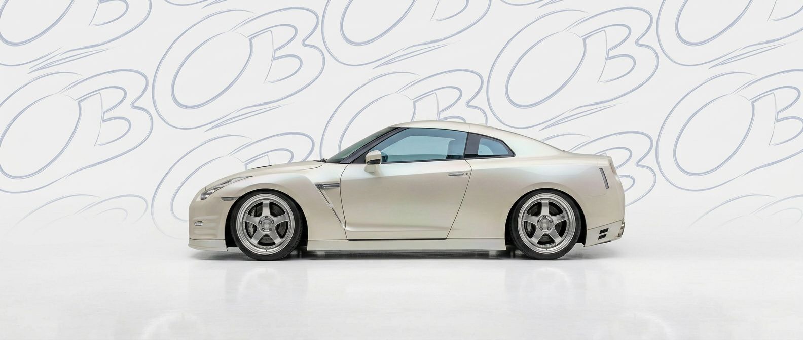 Front-angle view of 2014 Nissan GT-R 2014 - Durable and stylish exterior enhancement.