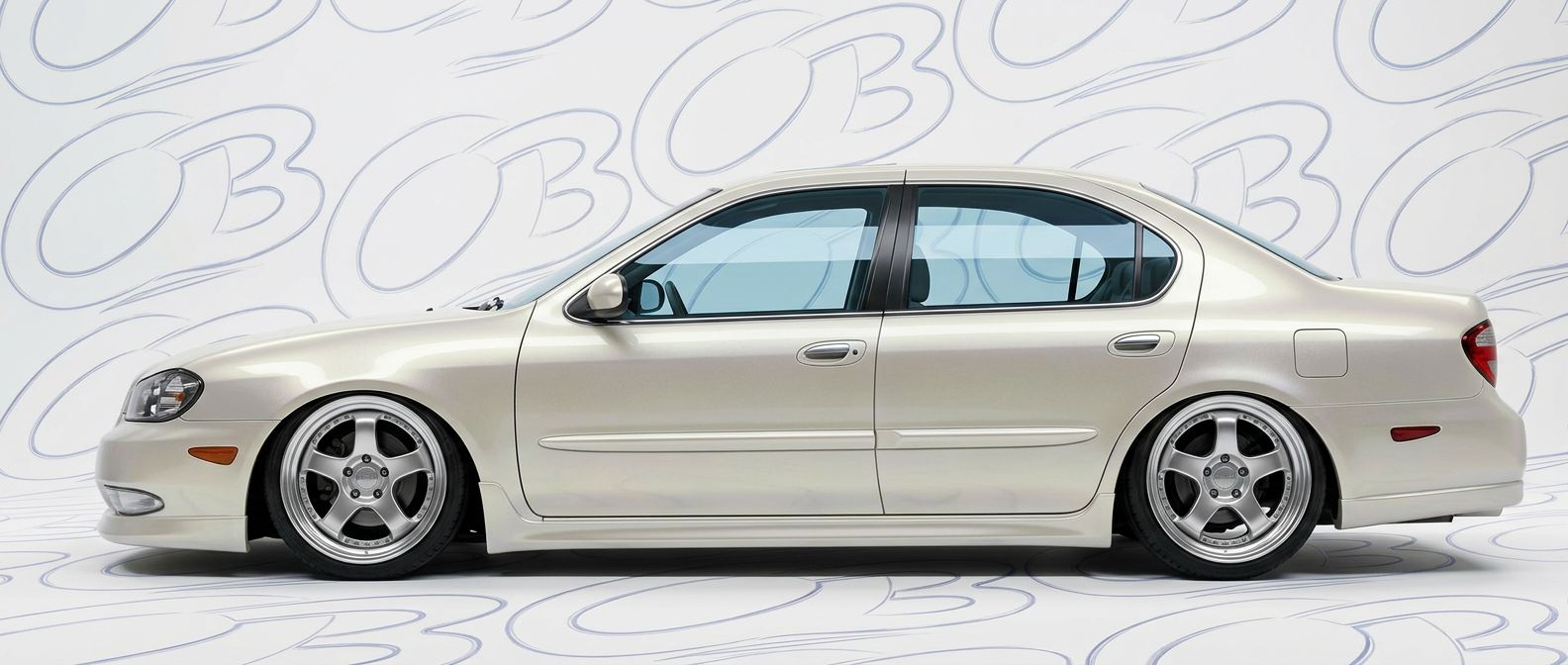 Custom 2000 for 2000 Nissan Maxima - Premium aerodynamic automotive body parts.