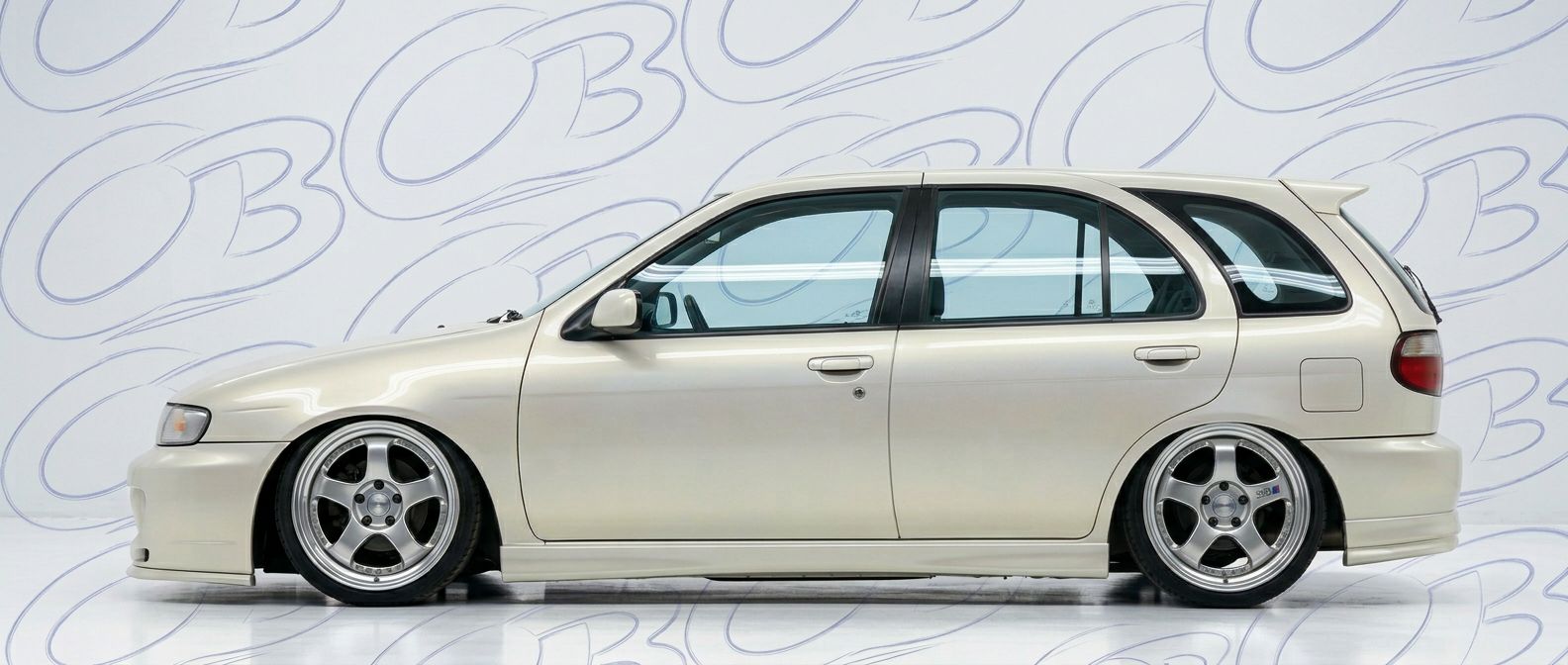 Top-tier 1998 Nissan Pulsar 1998 featuring a high-gloss finish and carbon fiber weave.