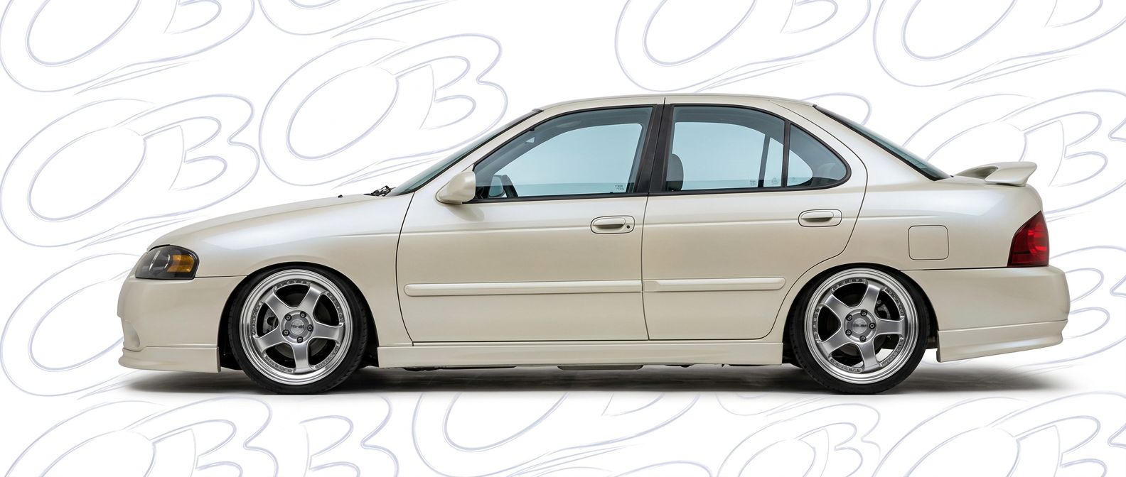 Professional automotive photography of a 2001 Nissan Sentra with high-fidelity 2001.
