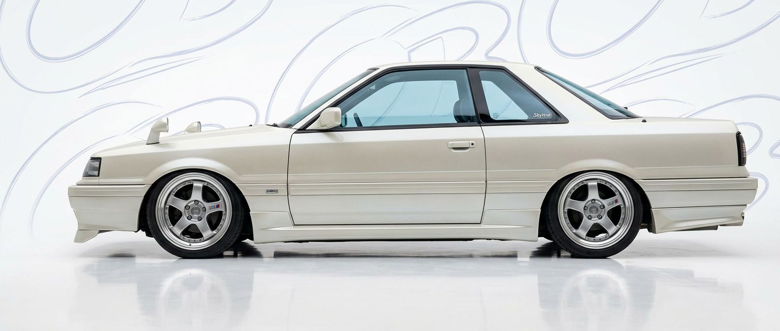 Professional automotive photography of a 1985 Nissan Skyline with high-fidelity 1985.