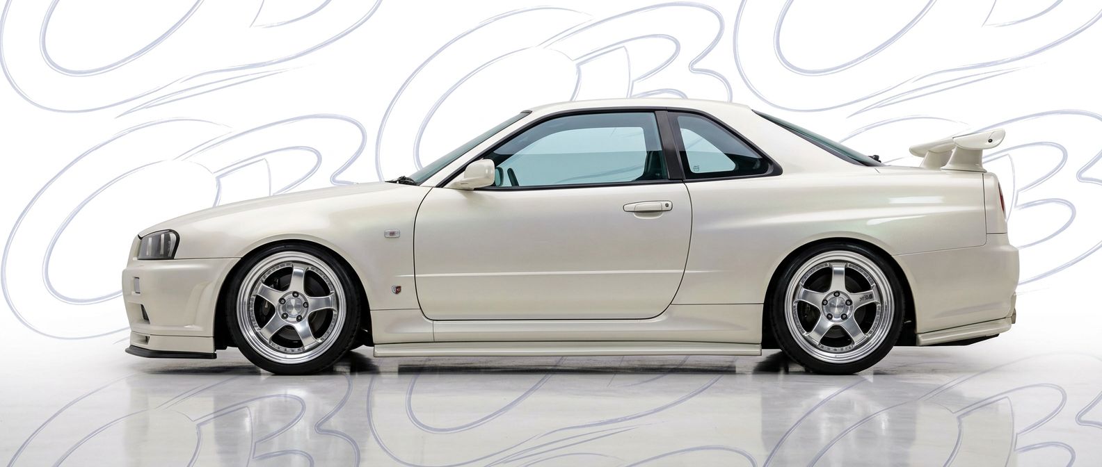 Top-tier 2003 Nissan Skyline (R34) GTR 2003 featuring a high-gloss finish and carbon fiber weave.