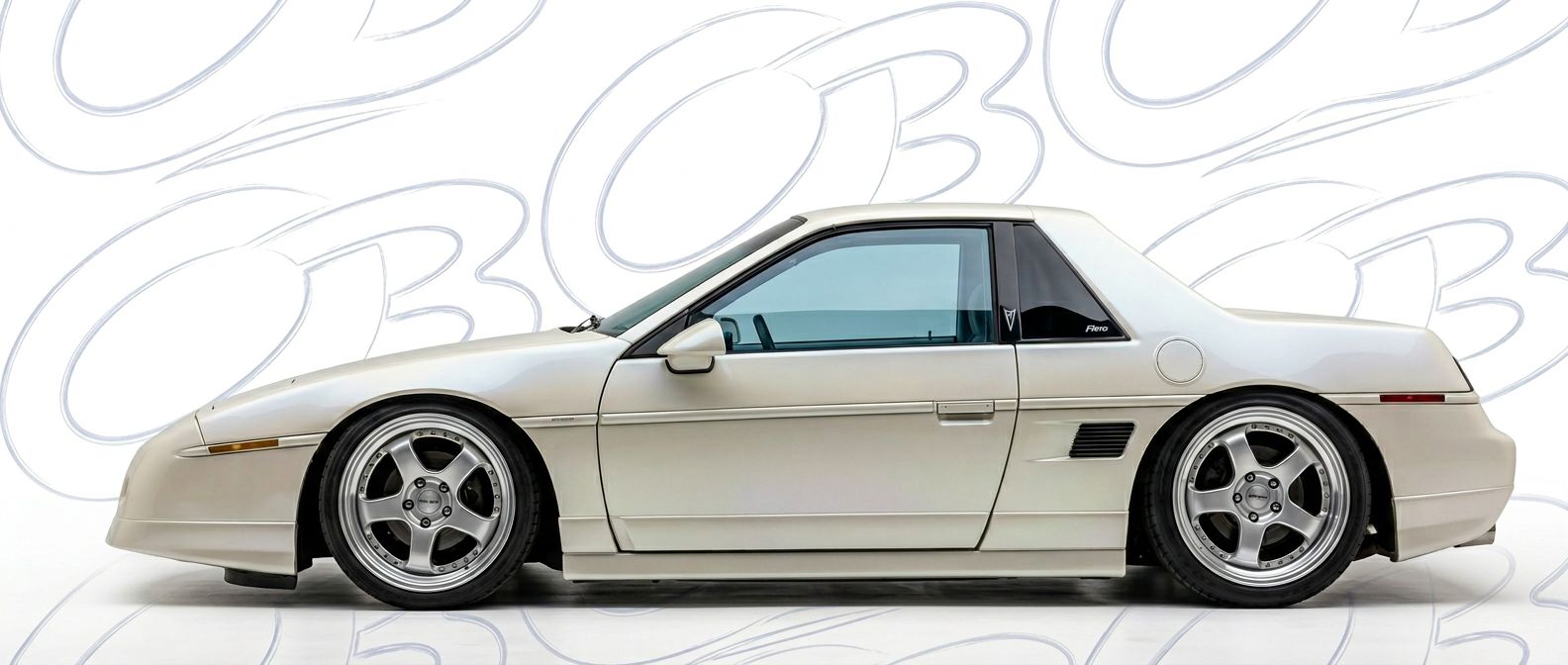 Aerodynamic 1987 Pontiac Fiero 1987 - Sleek design for enhanced vehicle styling.