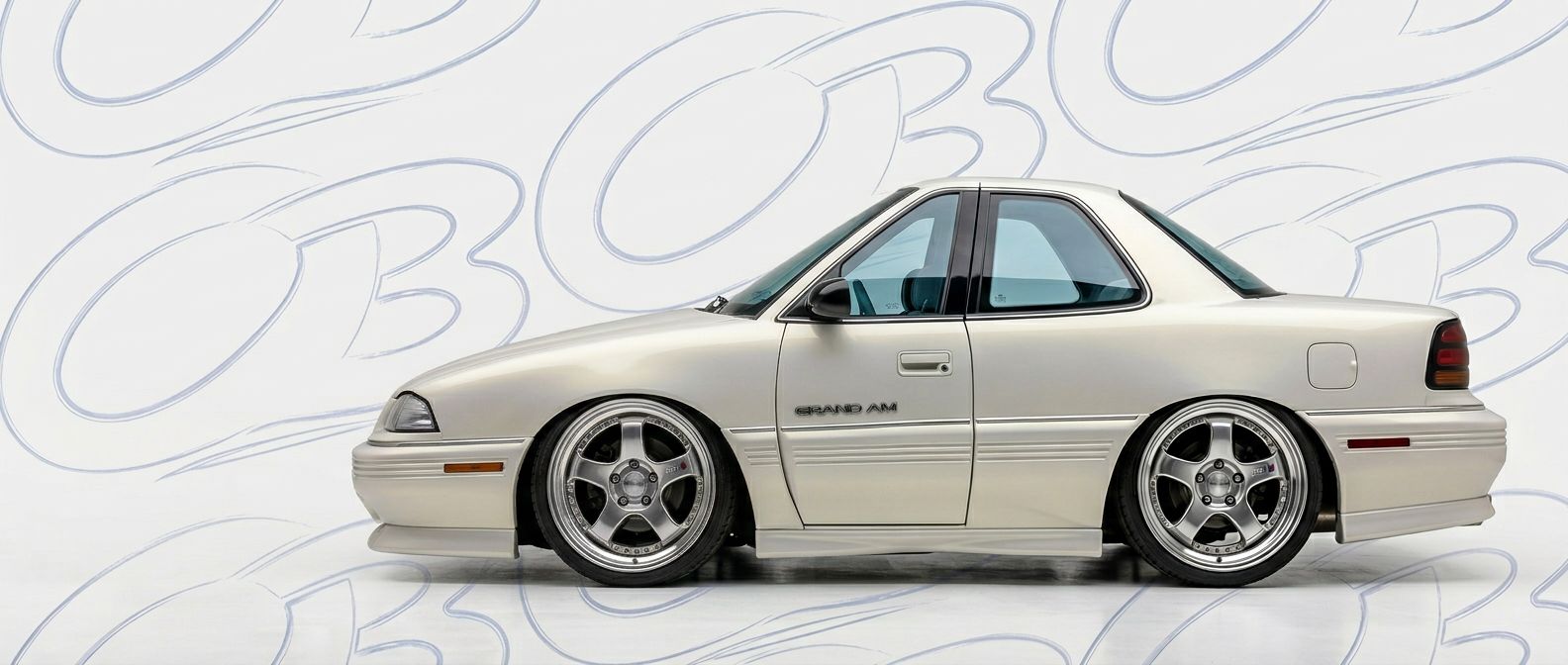 Top-tier 1992 Pontiac Grand Am 1992 featuring a high-gloss finish and carbon fiber weave.