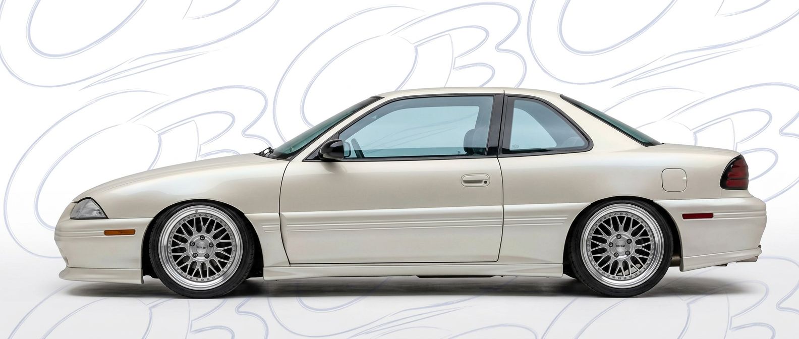 Top-tier 1995 Pontiac Grand Am 1995 featuring a high-gloss finish and carbon fiber weave.