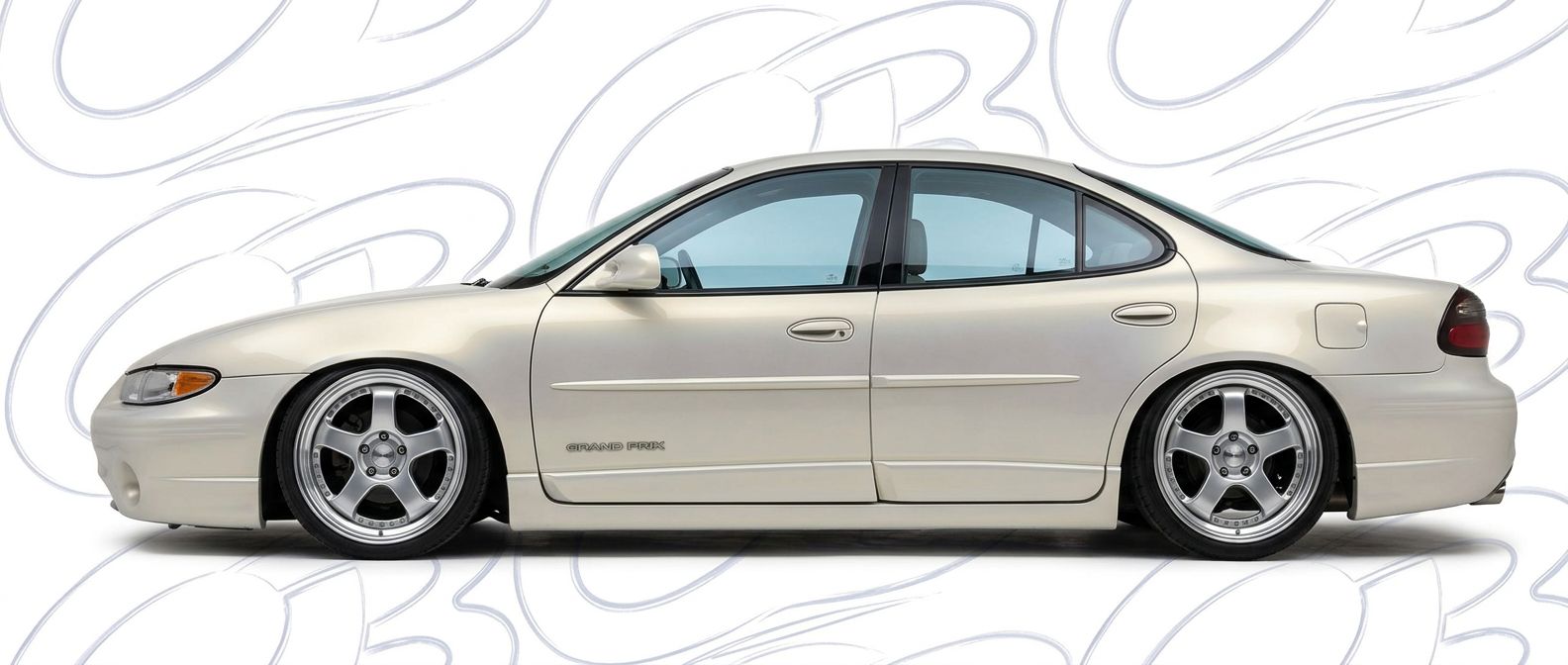 Professional automotive photography of a 1998 Pontiac Grand Prix with high-fidelity 1998.