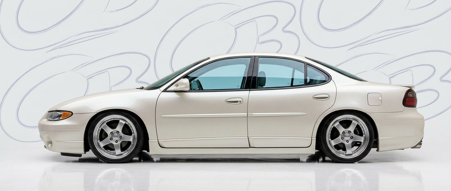 Front-angle view of 1999 Pontiac Grand Prix 1999 - Durable and stylish exterior enhancement.