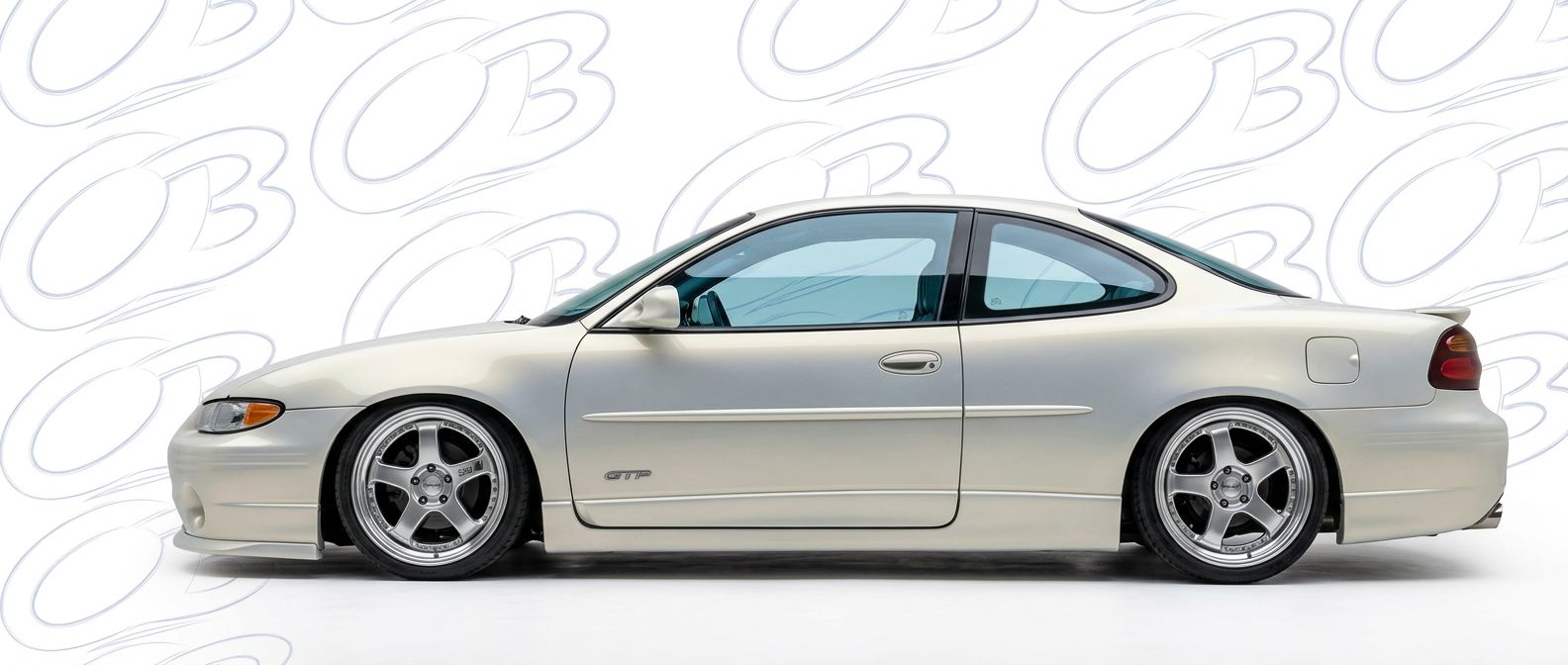 Top-tier 2001 Pontiac Grand Prix 2001 featuring a high-gloss finish and carbon fiber weave.