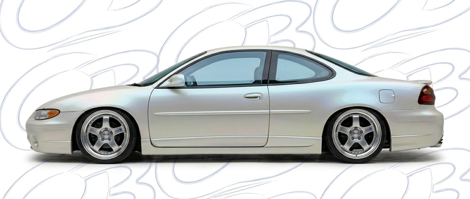 Professional automotive photography of a 2002 Pontiac Grand Prix with high-fidelity 2002.