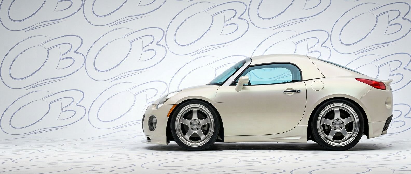 Top-tier 2009 Pontiac Solstice 2009 featuring a high-gloss finish and carbon fiber weave.