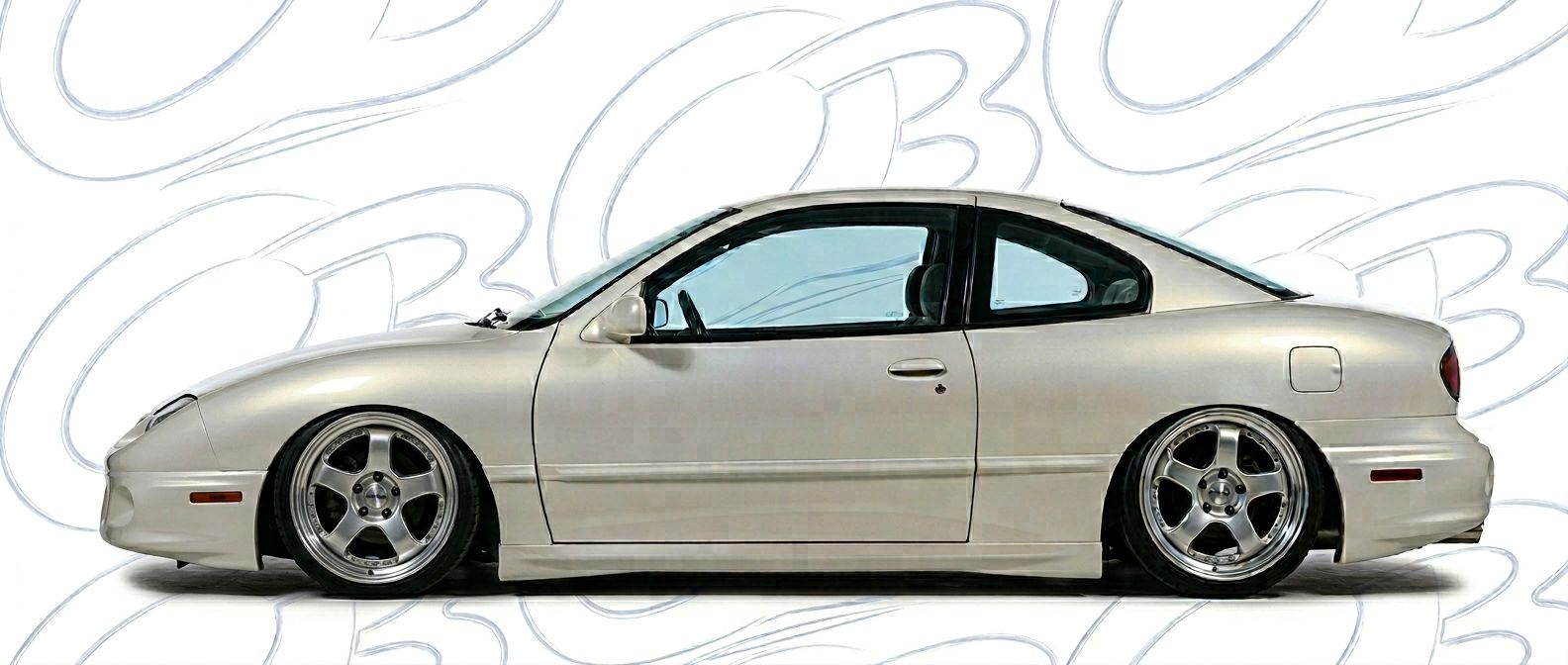 Professional automotive photography of a 1999 Pontiac Sunfire with high-fidelity 1999.