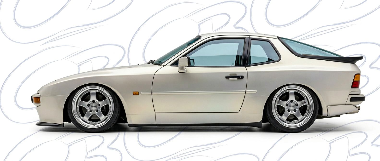 Professional automotive photography of a 1986 Porsche 944 with high-fidelity 1986.