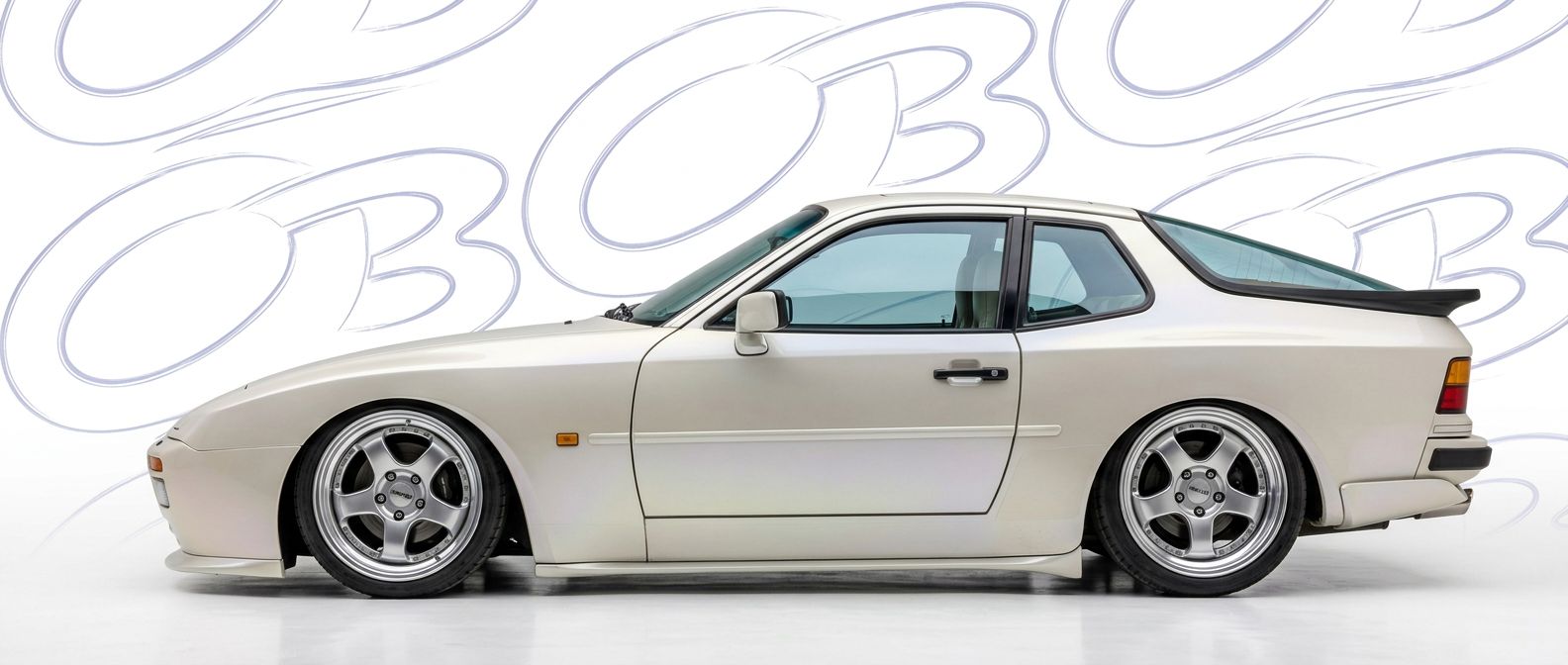 Top-tier  Porsche 944 944 featuring a high-gloss finish and carbon fiber weave.