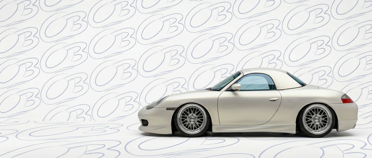 Top-tier 1998 Porsche Boxster 1998 featuring a high-gloss finish and carbon fiber weave.