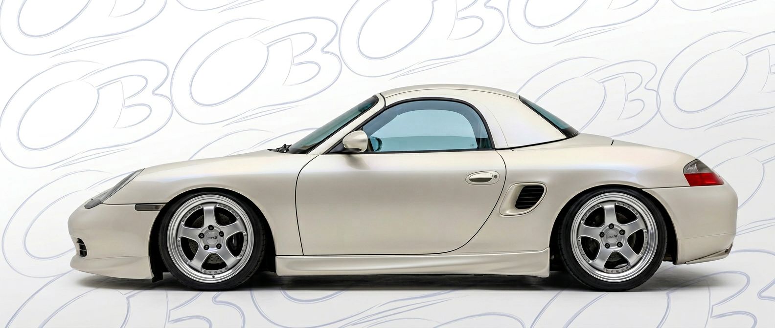 Top-tier 2004 Porsche Boxster 2004 featuring a high-gloss finish and carbon fiber weave.