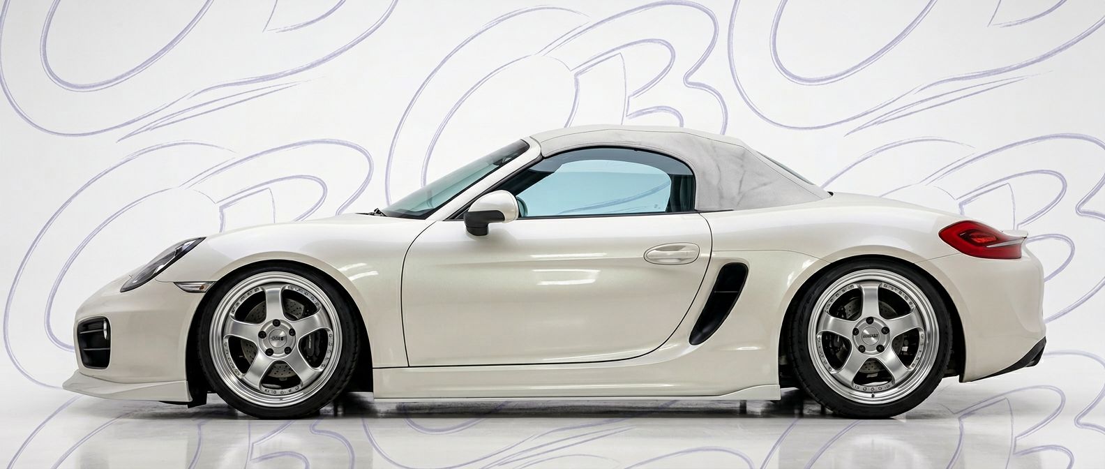 Professional automotive photography of a 2012 Porsche Boxster with high-fidelity 2012.