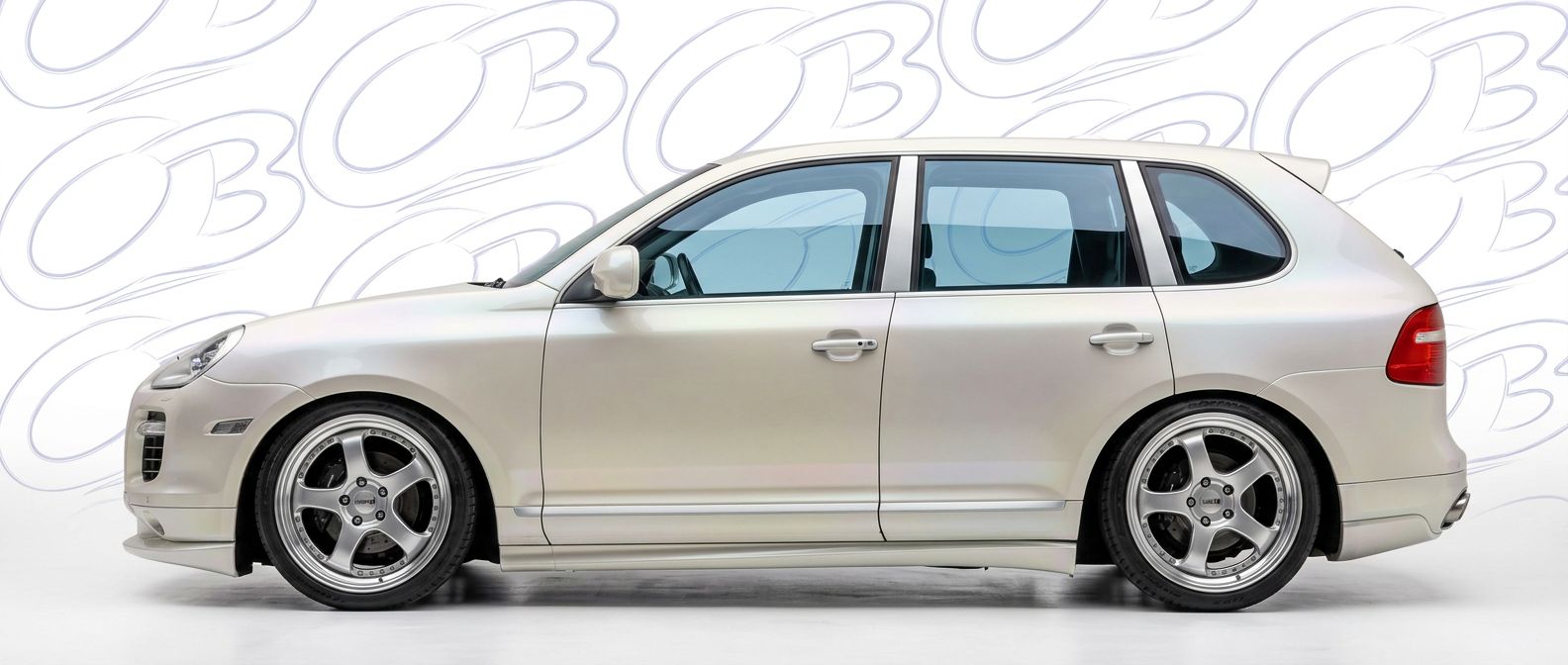 Top-tier 2009 Porsche Cayenne 2009 featuring a high-gloss finish and carbon fiber weave.