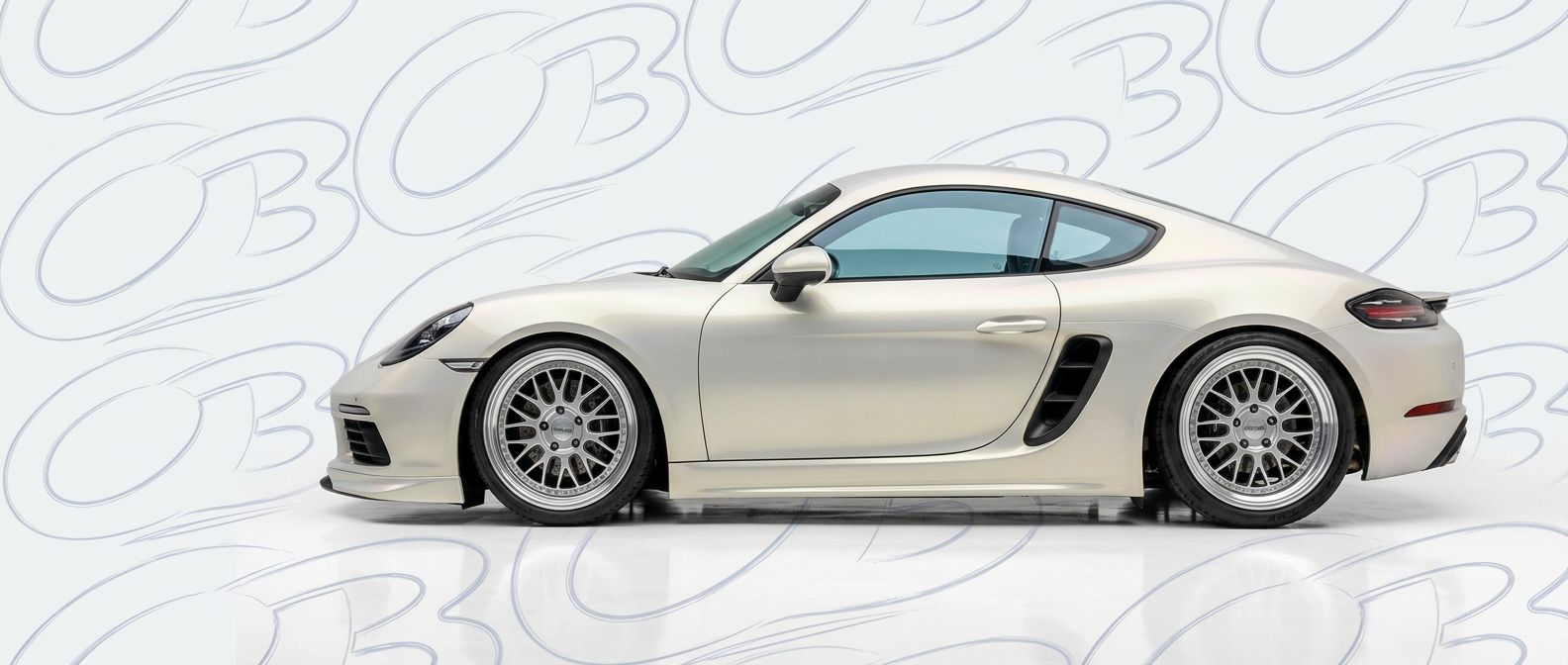 Top-tier 2018 Porsche Cayman 2018 featuring a high-gloss finish and carbon fiber weave.