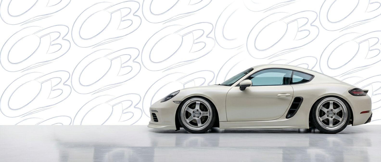 Top-tier 2019 Porsche Cayman 2019 featuring a high-gloss finish and carbon fiber weave.