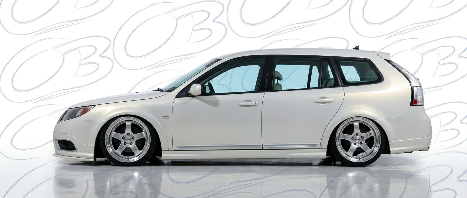 Professional automotive photography of a  Saab 9-3X with high-fidelity 9-3X.
