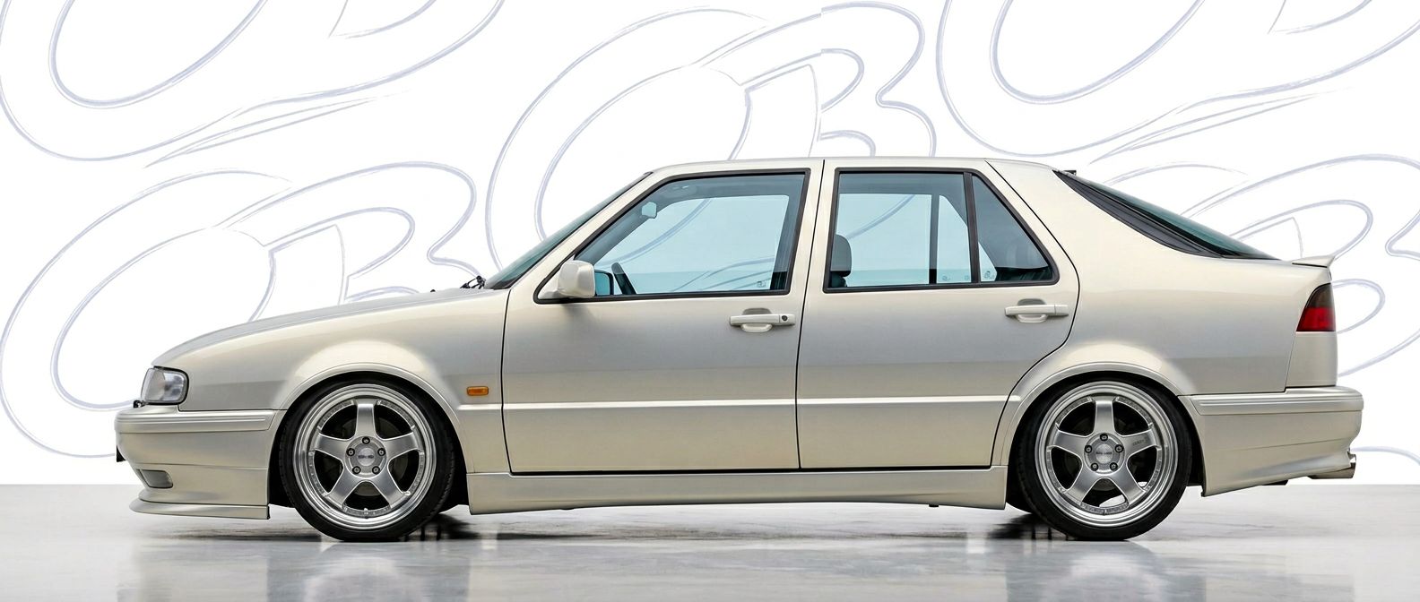 Professional automotive photography of a 1989 Saab 9000 with high-fidelity 1989.