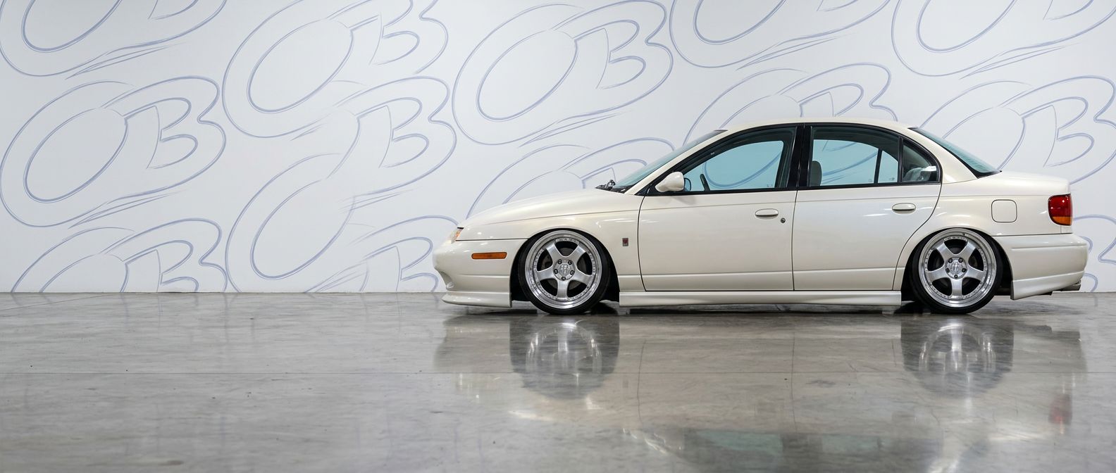 High-quality 1998 Saturn SL 1998 exterior shot with professional studio lighting.