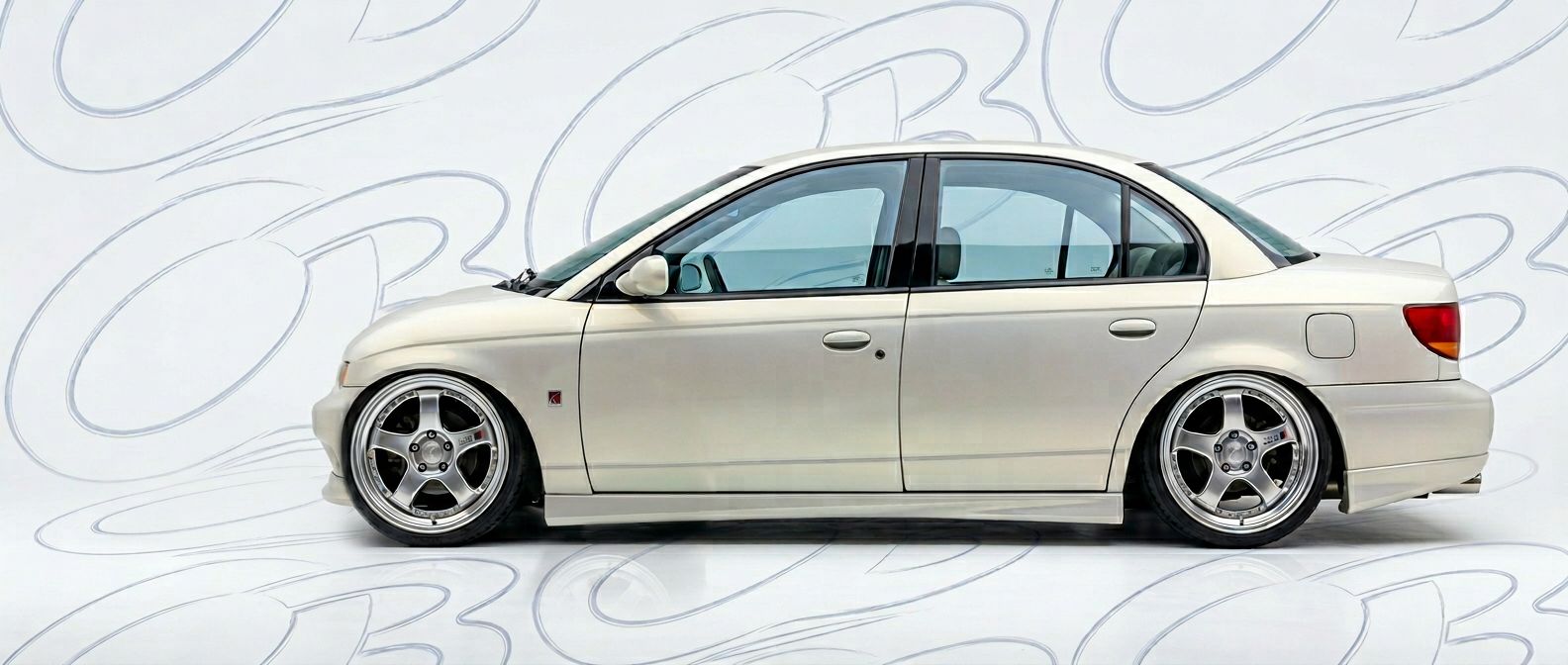 High-quality 2000 Saturn SL 2000 exterior shot with professional studio lighting.