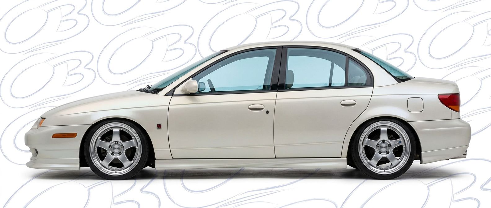 Professional automotive photography of a 2002 Saturn SL with high-fidelity 2002.