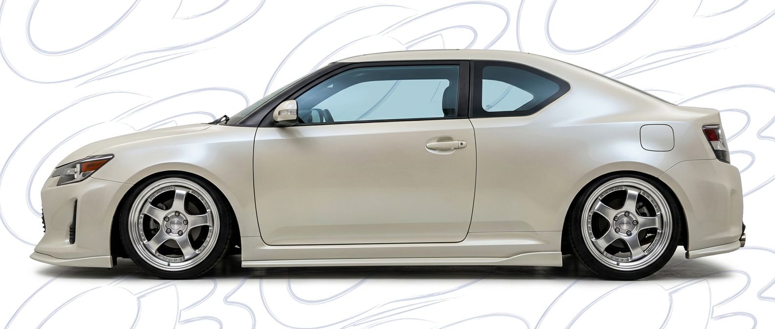 Professional automotive photography of a 2013 Scion tC with high-fidelity 2013.