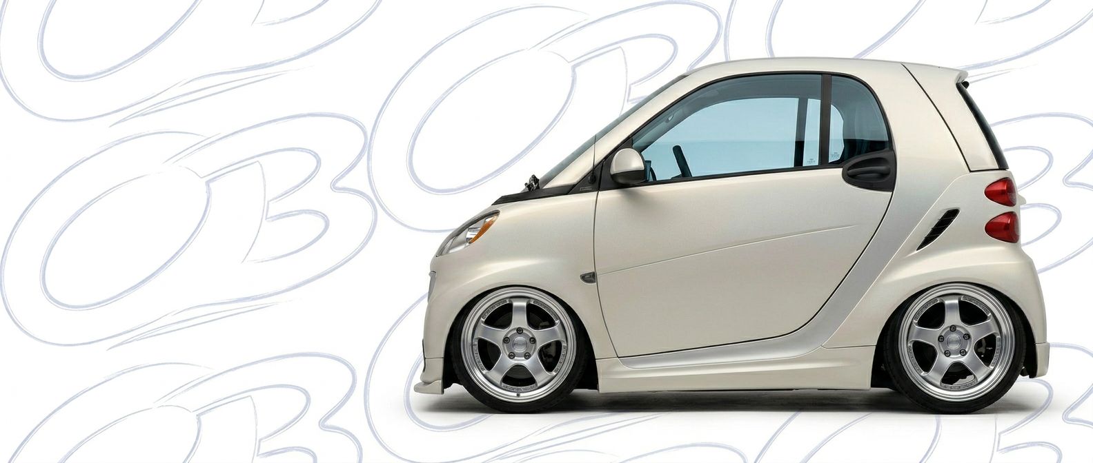 Professional automotive photography of a 2010 Smart fortwo with high-fidelity 2010.