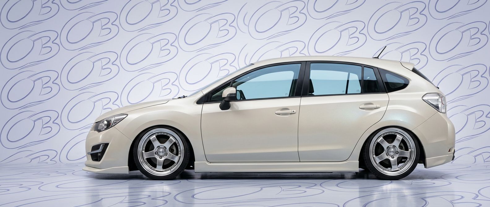 Professional automotive photography of a 2016 Subaru Impreza with high-fidelity 2016.