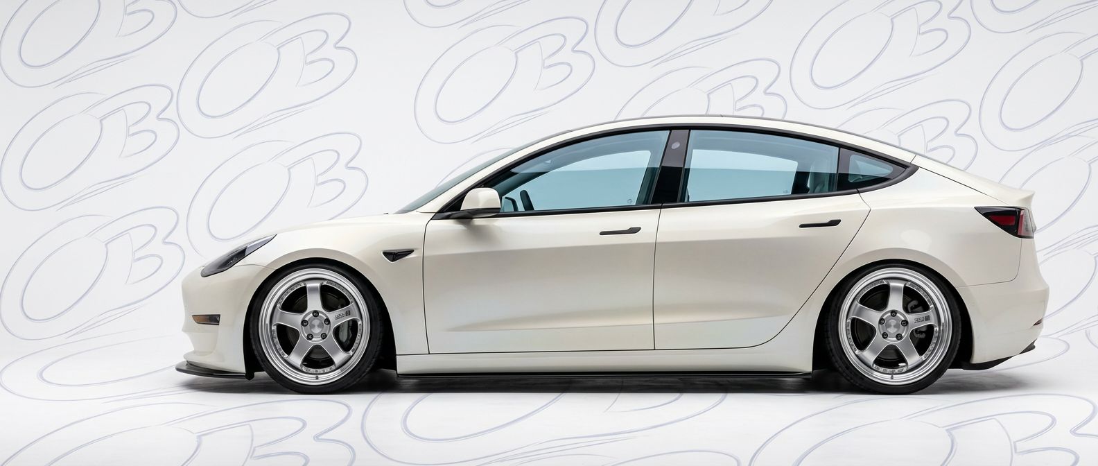 High-quality 2021 Tesla 3 2021 exterior shot with professional studio lighting.