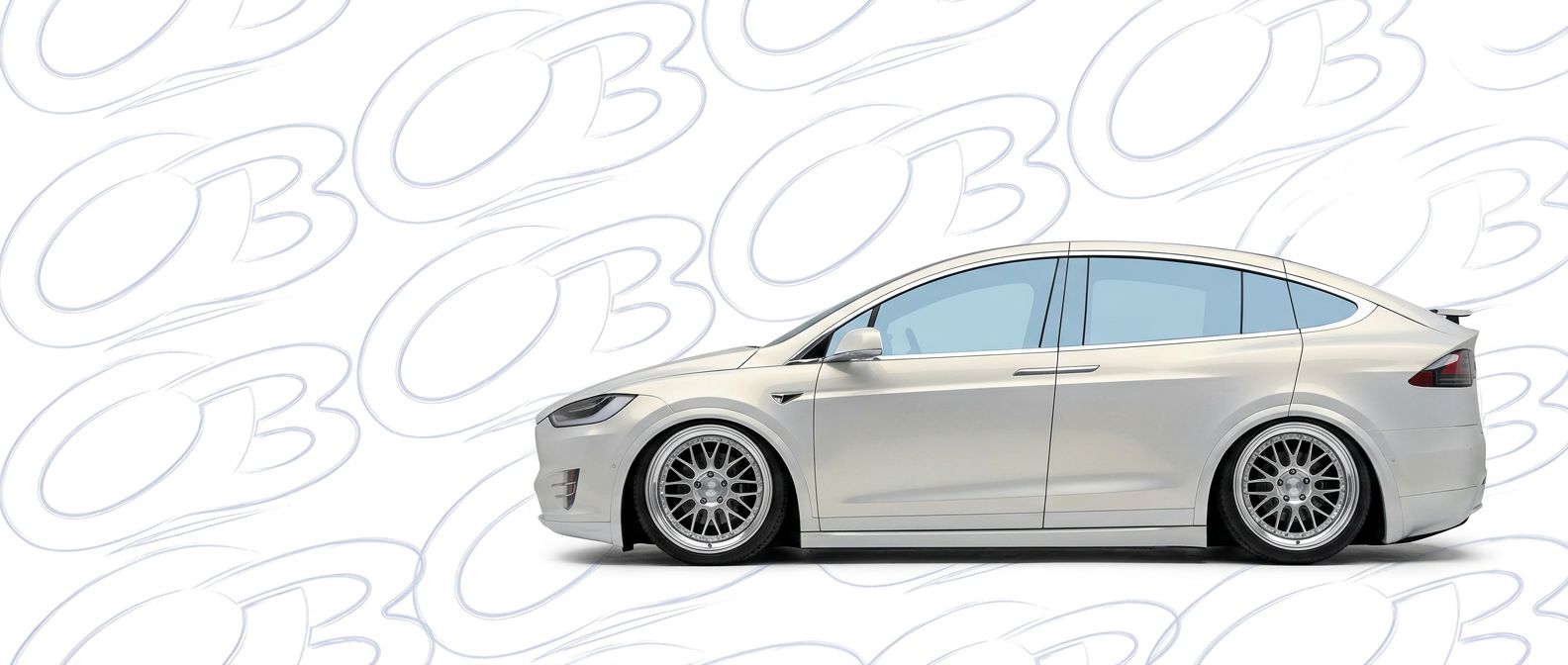 Top-tier 2020 Tesla X 2020 featuring a high-gloss finish and carbon fiber weave.