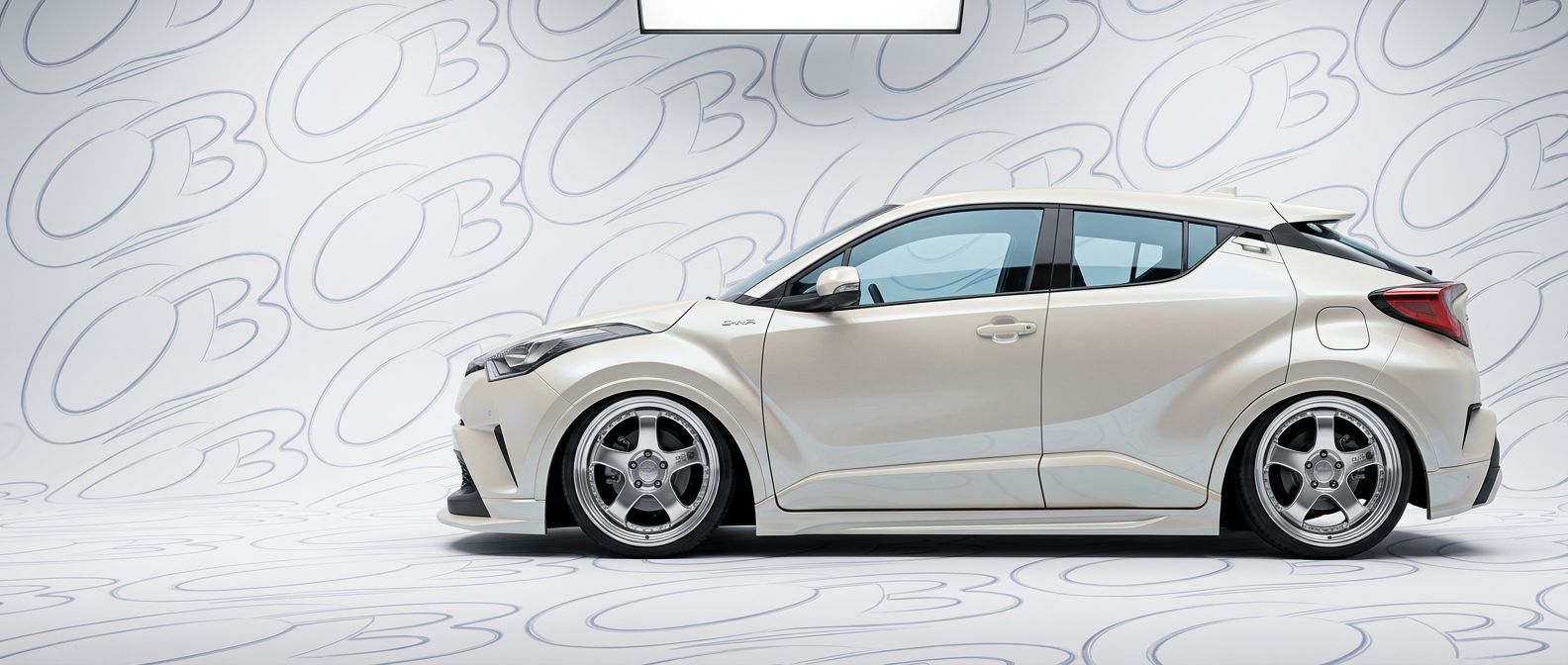 Top-tier 2019 Toyota C-HR 2019 featuring a high-gloss finish and carbon fiber weave.