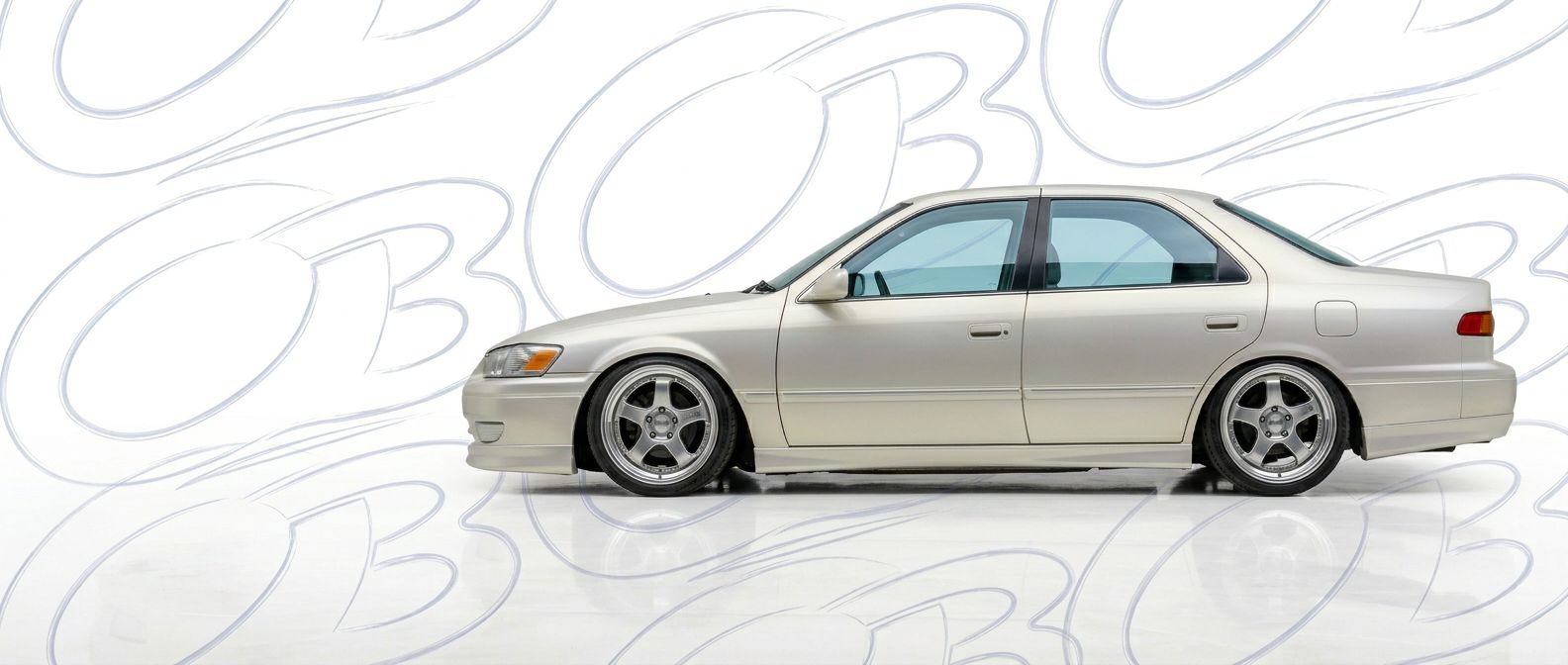 Professional automotive photography of a 2001 Toyota Camry with high-fidelity 2001.