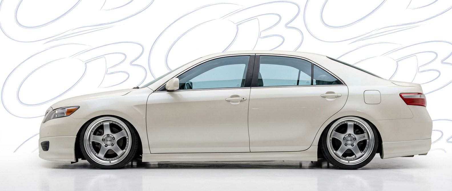 Top-tier 2009 Toyota Camry 2009 featuring a high-gloss finish and carbon fiber weave.