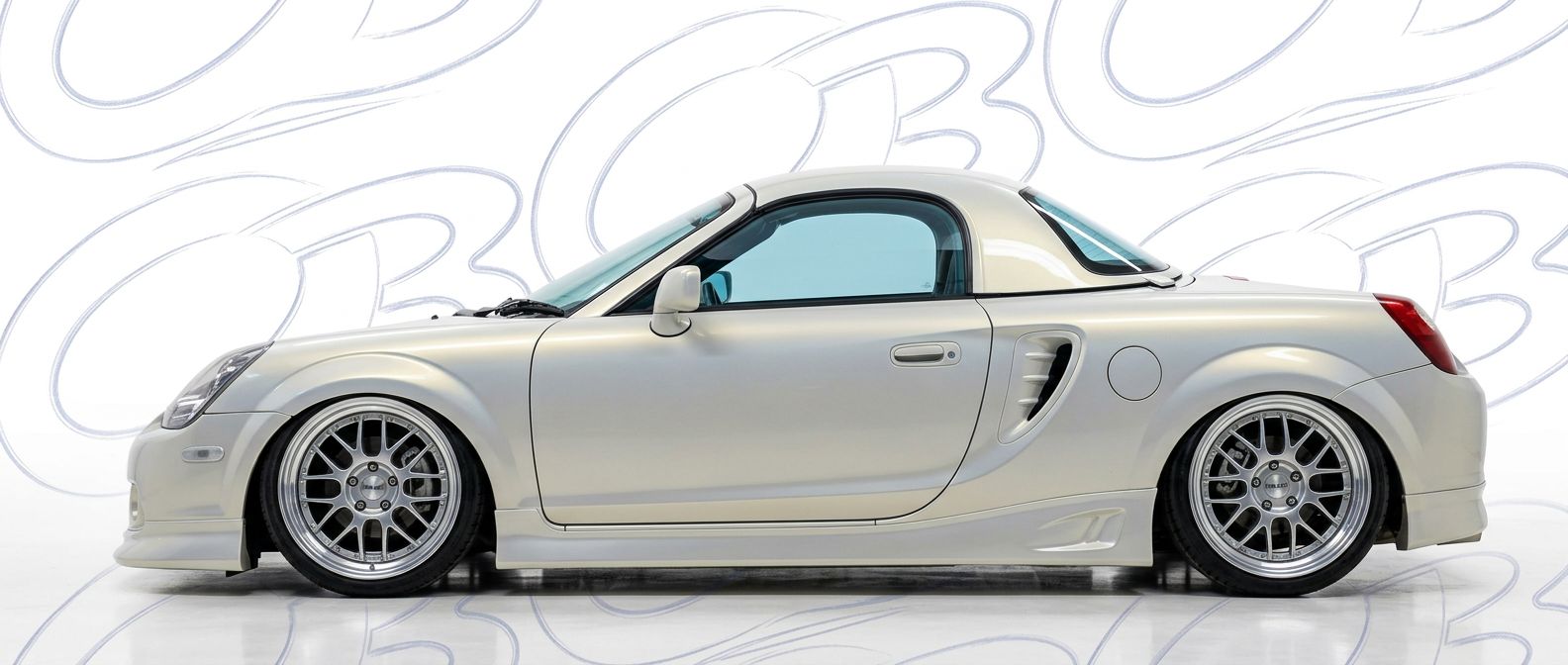 Top-tier 2005 Toyota MR2 Spyder 2005 featuring a high-gloss finish and carbon fiber weave.
