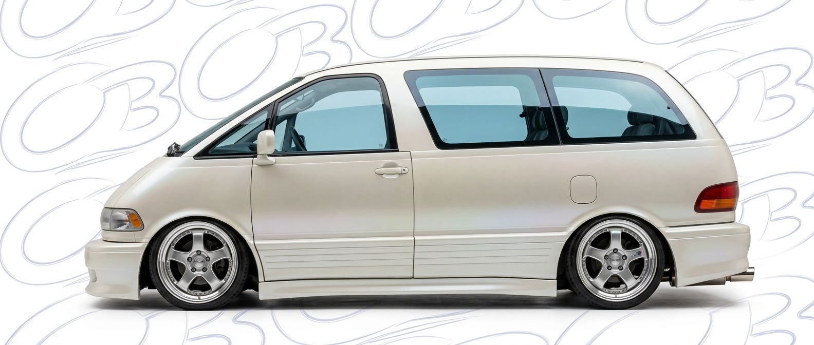 Professional automotive photography of a 1996 Toyota Previa with high-fidelity 1996.