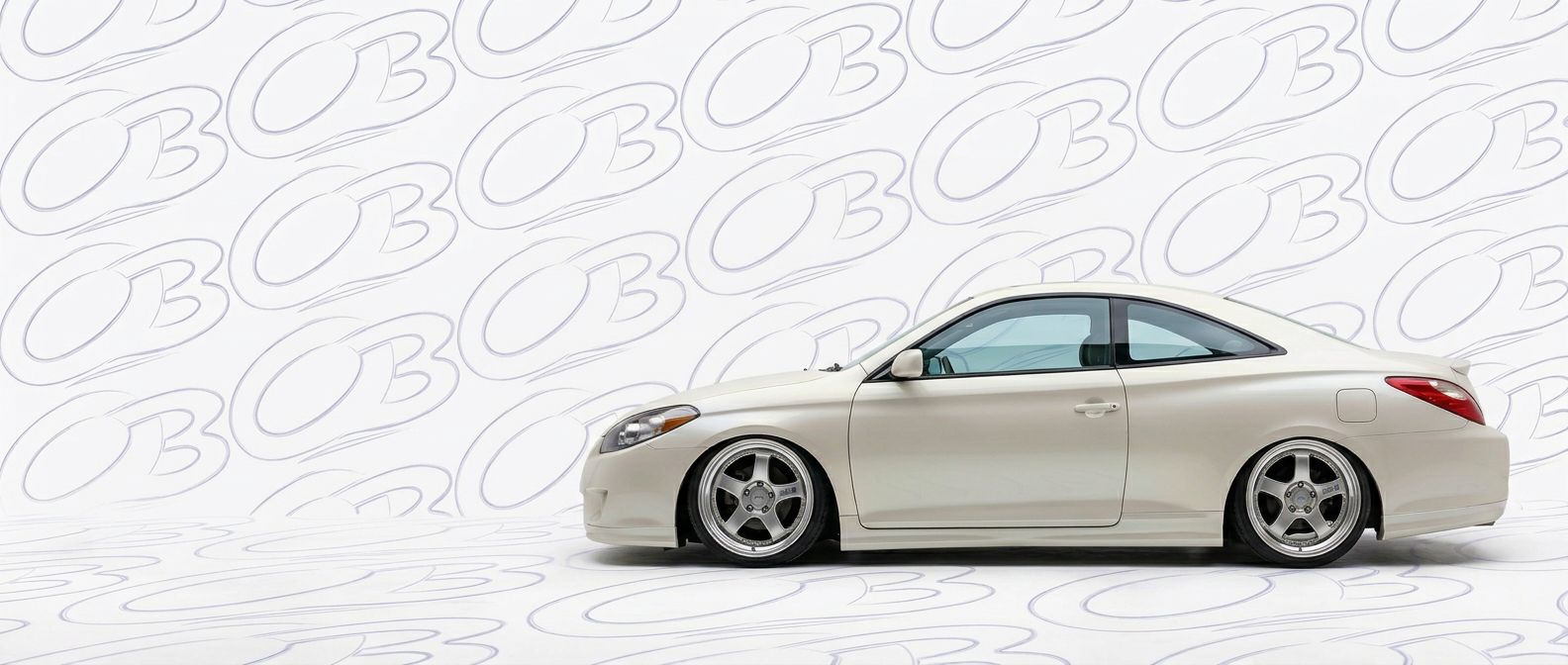 Top-tier 2003 Toyota Solara 2003 featuring a high-gloss finish and carbon fiber weave.