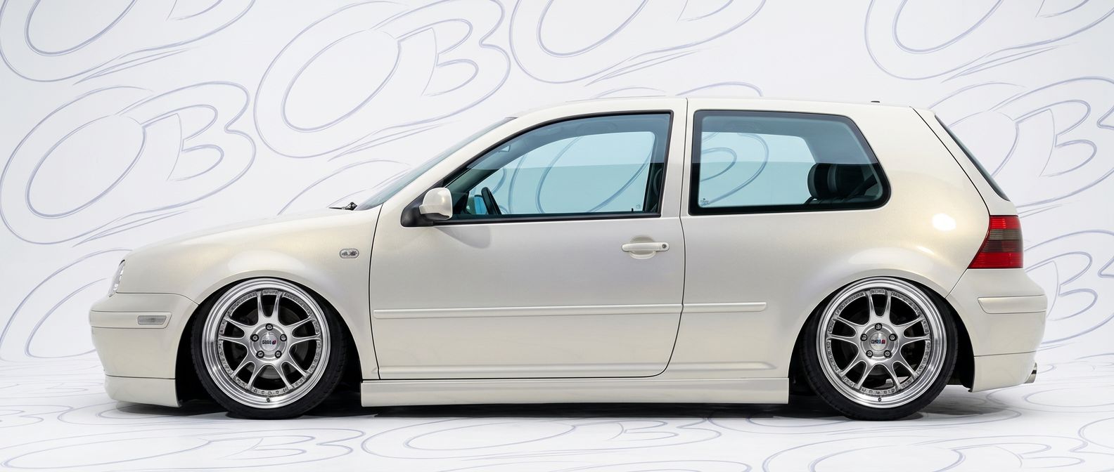 Professional automotive photography of a 2000 Volkswagen Golf with high-fidelity 2000.