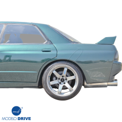 ModeloDrive FRP CFAC Wide Body Fenders (rear) 4pc > Nissan Skyline (R32) 1990-1994 > 4dr Sedan image - 3