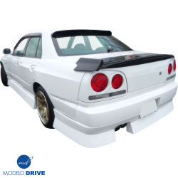 ModeloDrive FRP URA Wide Body Fenders (rear) 4pc > Nissan Skyline (R34) GTT 1999-2004 > 4dr Sedan image - 20