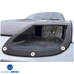 ModeloDrive Carbon Fiber JSPE Headlight Housings > Mazda Miata (NA) 1990-1996 image - 21