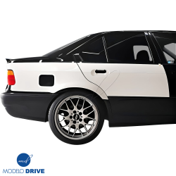 ModeloDrive FRP FIT Wide Body Fender Flares (rear) > BMW 318i, 323i, 325i, 328i (E36) 1992-1998 > 4dr image - 3