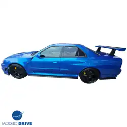 FRP GTR Conversion Fenders (rear) > Nissan Skyline (R34) GTT 1999-2004 > 4dr Sedan image - 8