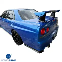 FRP GTR Conversion Fenders (rear) > Nissan Skyline (R34) GTT 1999-2004 > 4dr Sedan image - 12