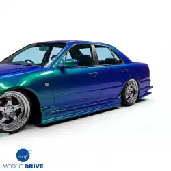 FRP URA GT Side Skirts > Nissan Skyline (R34) GTT 1999-2004 > 4dr Sedan image - 2
